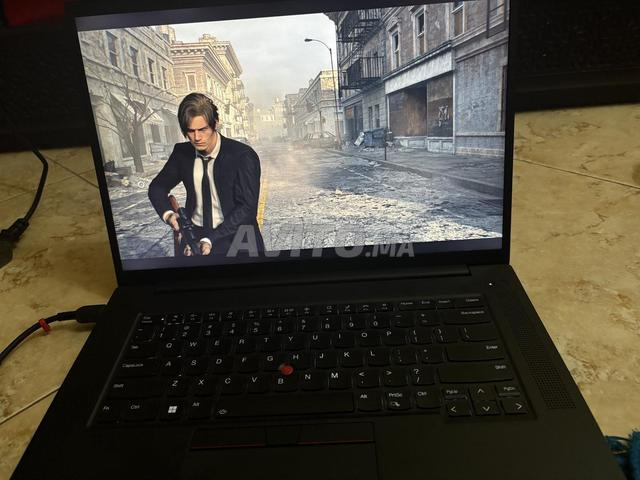لينوفو ثينك باد بي 1 الجيل 6 i7 13800 RTX 4080 32 جيجا 1 تيرابايت