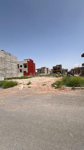 أرض بثلاث واجهات بحي بالميي دو تارغا