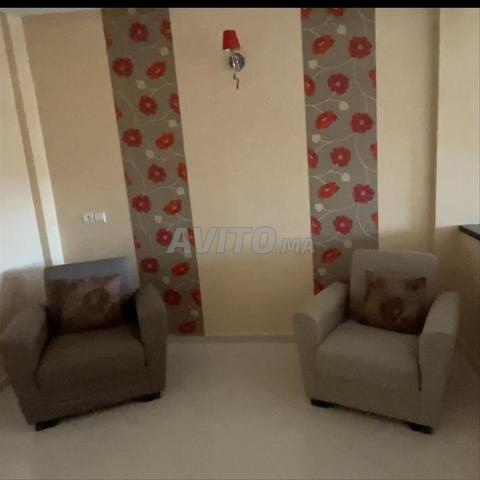 Deux canapés une place