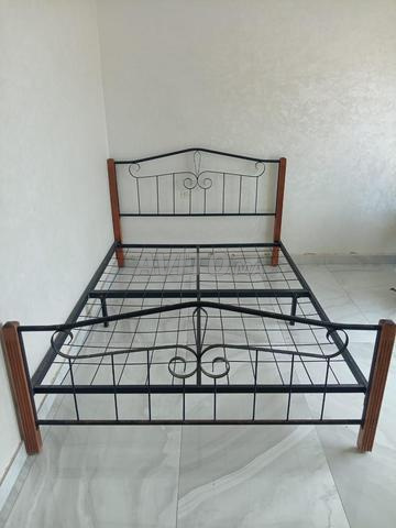 2 أسرة خشب وحديد