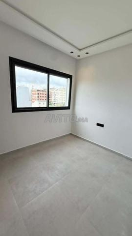 Appartement à louer 90 m² à Moujahidine - 2