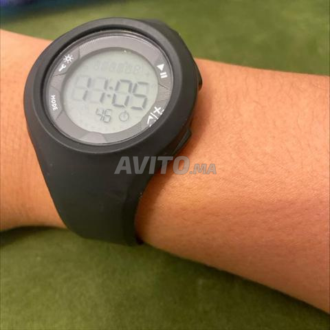 Montre Decathlon noire prix négociable