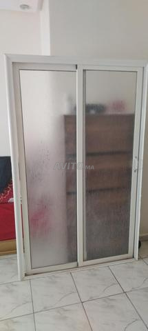 Coulisses aluminium de douche
