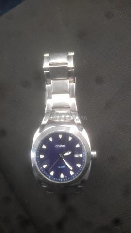 Montre homme Adidas très bon état