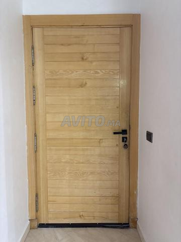 Porte en bois massif frêne