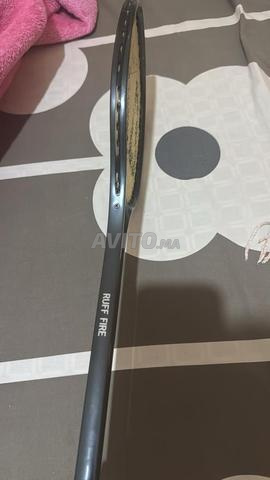 Raquette de tennis en excellent état