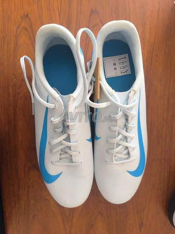 Chaussures de sport pour le football