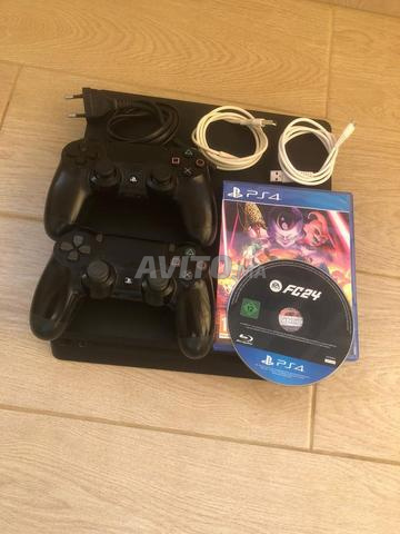 PS4 slim, 2 manettes, jeux FC24 & Dragon Ball