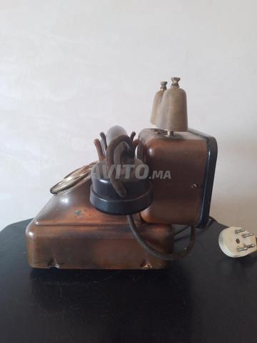 Téléphone fixe antique en cuivre - 2
