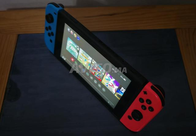 Nintendo Switch avec 3 jeux