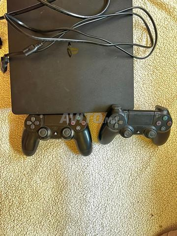 PS4 Slim avec 7 jeux - 2