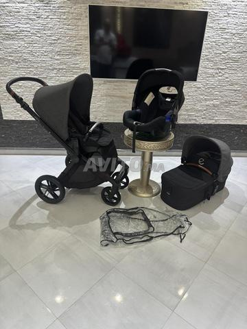 Une poussette trio Jane muum - 2