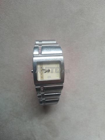 Montre de luxe pour femme en bon état
