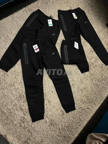 Pantalon Nike tech noir et blanc