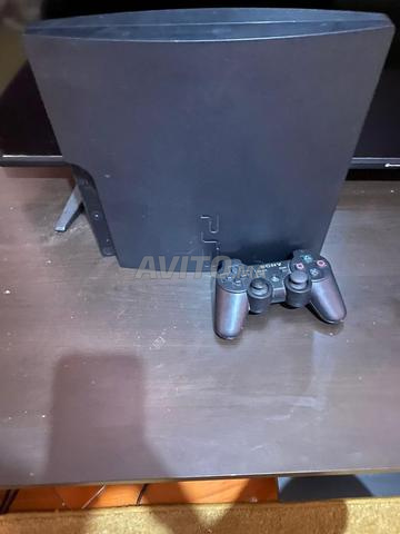 PS3 encore neuf avec 14 jeux