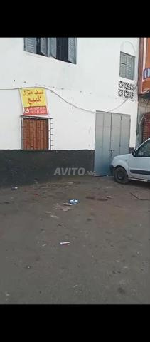 Maison à fourche à vendre avec demi-toit et magasin prêt à vendre