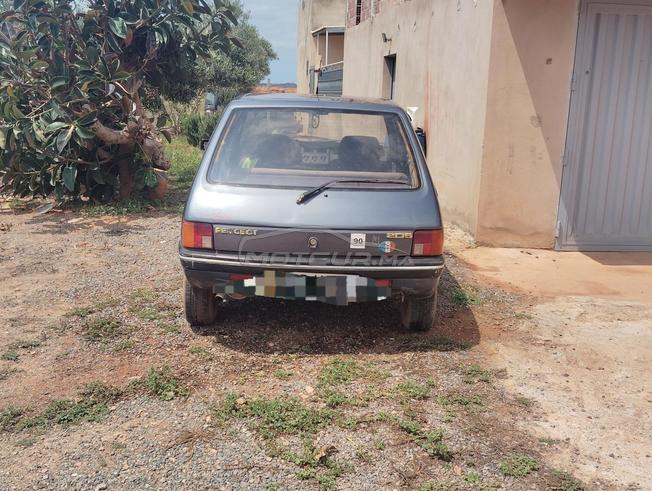 سيارة بيجو 205