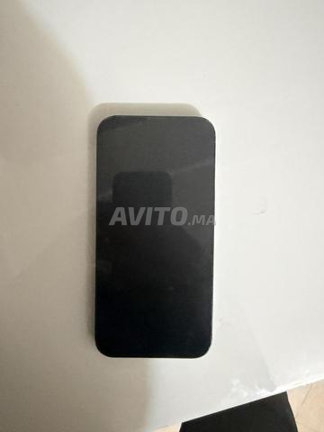 iPhone 13 128Go à vendre en très bon état
