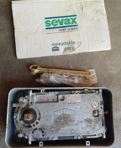 Mécanisme de porte va-et-vient