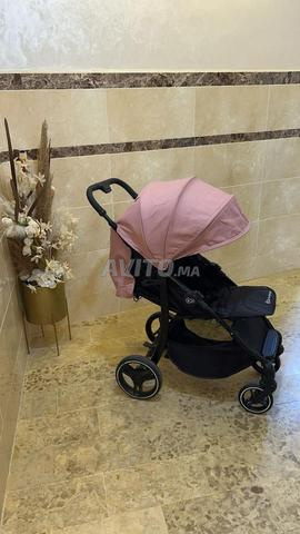 عربة أطفال جديدة