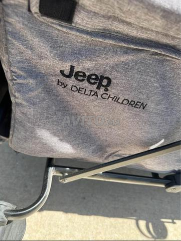 Chariot pliable avec toit par Jeep