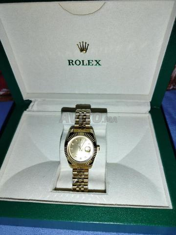 Montre Rolex dorée pour femme