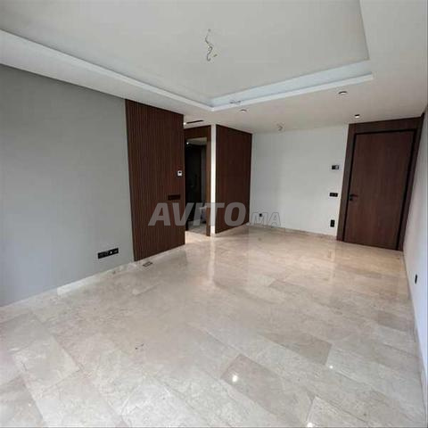 172595-Appt à louer à 15500DH à Casablanca Finance - 2
