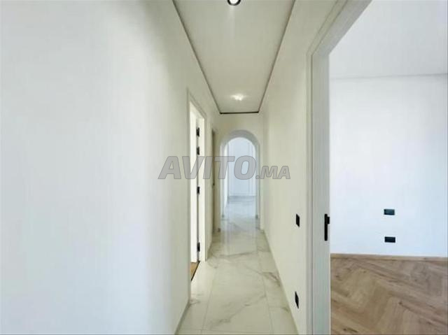 168616-Appt à louer à 12000DH à Ain Diab - 2
