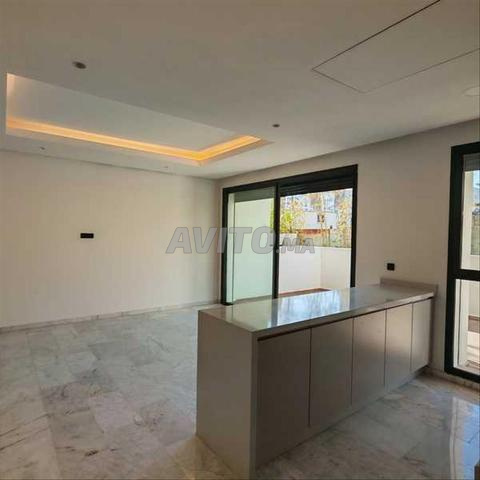 163790-Appt à louer à 9500DH à Casablanca Finance - 2