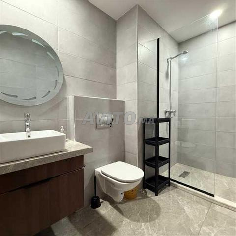 157874-Appt à louer à 8900DH à Casablanca Finance - 2