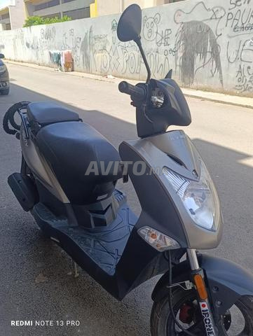 Kymco 4T en excellent état