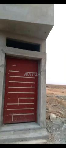 باب خارجي من حديد مشغول بتفاصيل ستانلس ستيل - 2