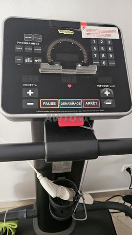 Tapis de course Technogym en très bon état - 2