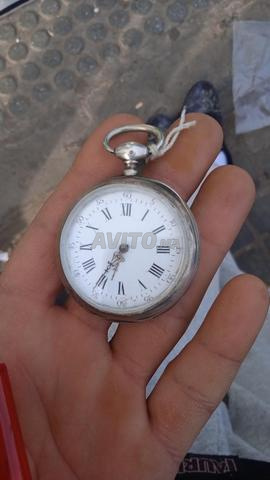Montre "Niqra" argentée pure