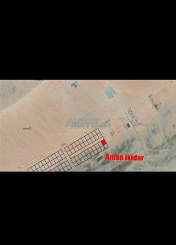 Terrain de 400 m² à côté de la route principale, deux façades