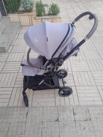 Poussette rotative comme neuve - 2