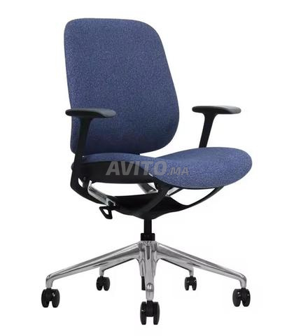 CHAISE EN TISSU A ROULETTES