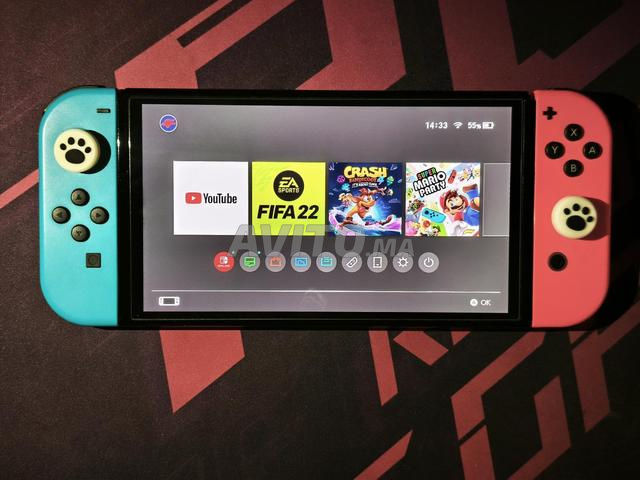 Nintendo Switch OLED avec 3 jeux et pochette