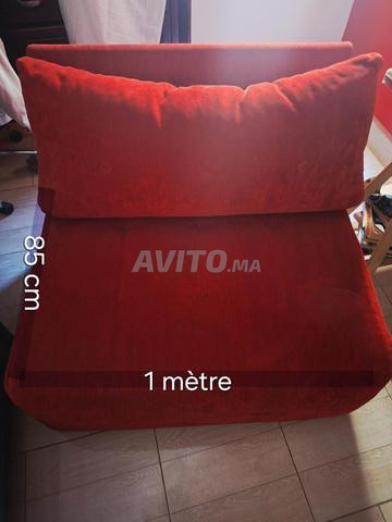 Fauteuil rouge bordeaux type année 2000