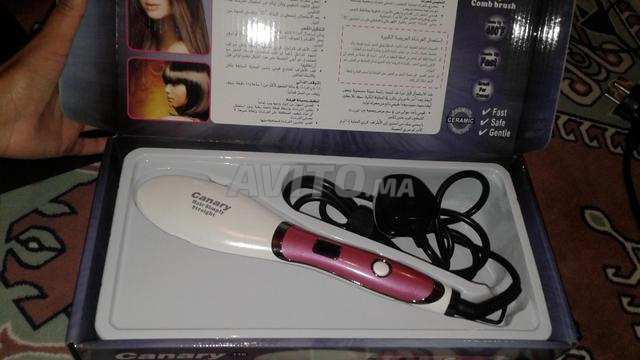 Peigne lisseur pour cheveux