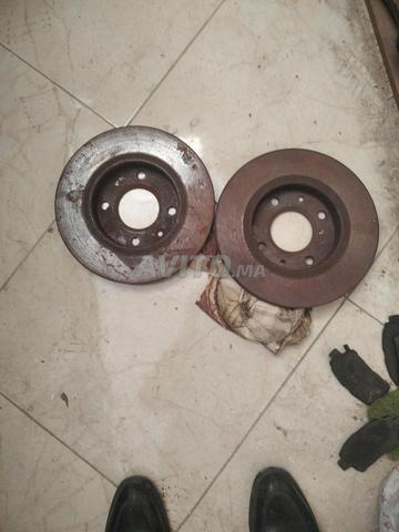 2 disques origine 206hdi et porte arrière droite