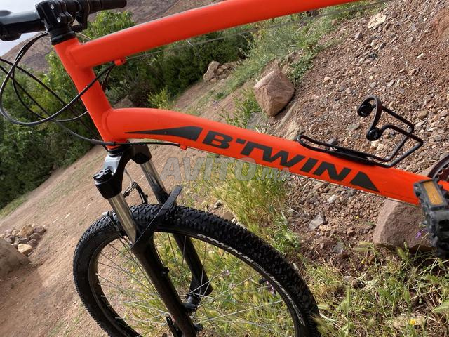 B’twin Rockrider 340 برتقالي