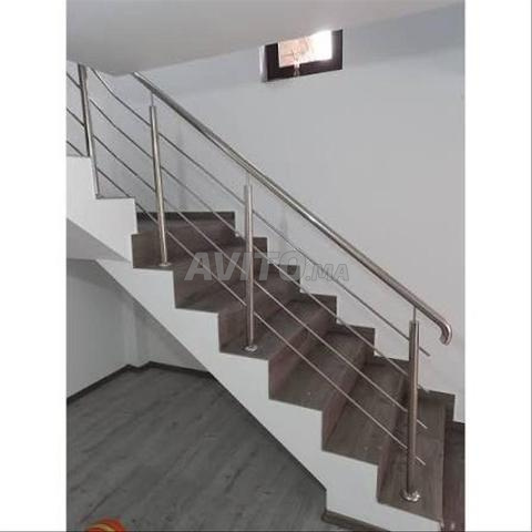 Travaux inox porte fenêtre escalier