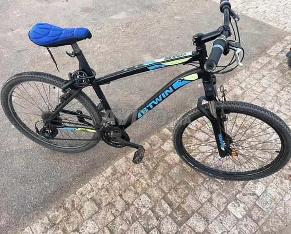 دراجة هوائية Btwin Rockrider 340 جبلية - أسود/Y