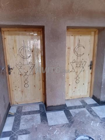 Menuisier Ouarzazate 13 ans d'expérience portes bois traditionnelles pose - 2