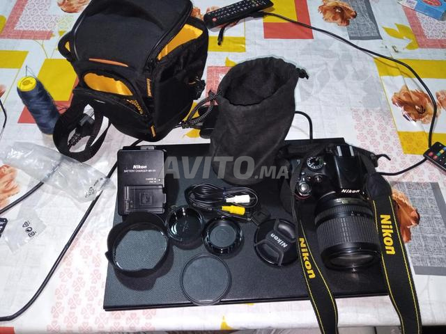 نيكون D5100 مع حقيبة وملحقات - 2