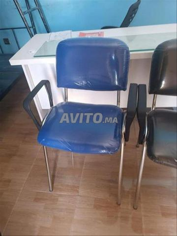 Chaise iso en tissu avec les accoudoirs en PVC