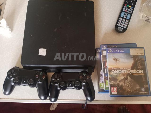 PlayStation 4 slim 2 manettes 3 jeux