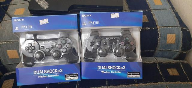 PlayStation 3 d'occasion avec 2 manettes