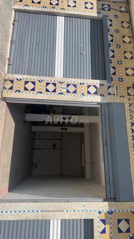Garage à louer dans le quartier Rmilat, 65 m² - 2